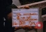 Image of wrecked buildings Saigon Vietnam, 1968, second 6 stock footage video 65675052385