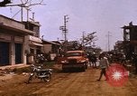 Image of wrecked buildings Saigon Vietnam, 1968, second 8 stock footage video 65675052385