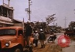 Image of wrecked buildings Saigon Vietnam, 1968, second 23 stock footage video 65675052385