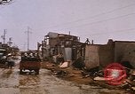 Image of wrecked buildings Saigon Vietnam, 1968, second 32 stock footage video 65675052385