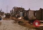 Image of wrecked buildings Saigon Vietnam, 1968, second 36 stock footage video 65675052385