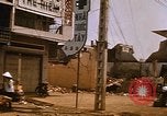 Image of wrecked buildings Saigon Vietnam, 1968, second 52 stock footage video 65675052385