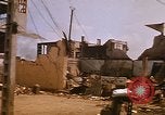 Image of wrecked buildings Saigon Vietnam, 1968, second 56 stock footage video 65675052385