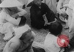 Image of funeral procession for hundreds of coffin Hue Vietnam, 1968, second 5 stock footage video 65675052391