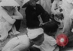 Image of funeral procession for hundreds of coffin Hue Vietnam, 1968, second 6 stock footage video 65675052391