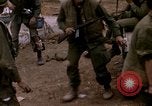 Standbild US-Marines starten Tet-Offensive in Hue Hue Vietnam, 1968, aus Sekunde 11 historischem Filmmaterial Videoclip 65675052395