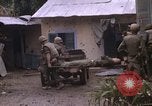 Standbild US-Marines starten Tet-Offensive in Hue Hue Vietnam, 1968, aus Sekunde 54 historischem Filmmaterial Videoclip 65675052395