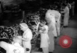 Image of Women war production workers at Douglas Aircraft Factory during World  Long Beach California USA, 1942, second 17 stock footage video 65675052405