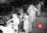 Image of Women war production workers at Douglas Aircraft Factory during World  Long Beach California USA, 1942, second 19 stock footage video 65675052405