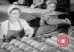 Image of war production workers at Douglas Aircraft Long Beach California USA, 1942, second 4 stock footage video 65675052406