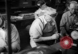 Image of war production workers at Douglas Aircraft Long Beach California USA, 1942, second 39 stock footage video 65675052406