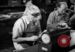 Image of war production workers at Douglas Aircraft Long Beach California USA, 1942, second 48 stock footage video 65675052406