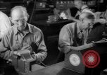 Image of war production workers at Douglas Aircraft Long Beach California USA, 1942, second 52 stock footage video 65675052406
