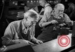 Image of war production workers at Douglas Aircraft Long Beach California USA, 1942, second 55 stock footage video 65675052406