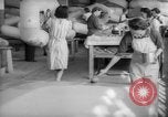 Image of Goodyear factory interiors Akron Ohio USA, 1942, second 55 stock footage video 65675052416
