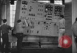 Image of Electricity production and factory production during World War 2 United States USA, 1941, second 5 stock footage video 65675052444