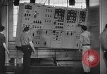 Image of Electricity production and factory production during World War 2 United States USA, 1941, second 7 stock footage video 65675052444