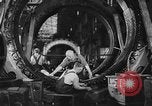 Image of Electricity production and factory production during World War 2 United States USA, 1941, second 14 stock footage video 65675052444
