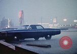Standbild Wasser auf der Straße Rapid City South Dakota USA, 1972, aus Sekunde 17 historischem Filmmaterial Videoclip 65675052499