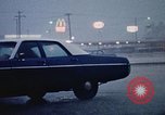 Standbild Wasser auf der Straße Rapid City South Dakota USA, 1972, aus Sekunde 40 historischem Filmmaterial Videoclip 65675052499