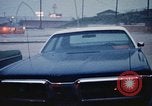 Standbild Wasser auf der Straße Rapid City South Dakota USA, 1972, aus Sekunde 48 historischem Filmmaterial Videoclip 65675052499
