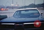 Standbild Wasser auf der Straße Rapid City South Dakota USA, 1972, aus Sekunde 50 historischem Filmmaterial Videoclip 65675052499