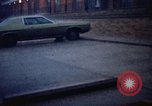 Standbild Wasser auf der Straße Rapid City South Dakota USA, 1972, aus Sekunde 59 historischem Filmmaterial Videoclip 65675052499