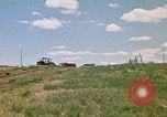 Image of trucks hauling debris Rapid City South Dakota USA, 1972, second 8 stock footage video 65675052516