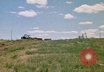Image of trucks hauling debris Rapid City South Dakota USA, 1972, second 9 stock footage video 65675052516