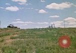 Image of trucks hauling debris Rapid City South Dakota USA, 1972, second 11 stock footage video 65675052516