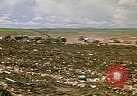 Image of trucks hauling debris Rapid City South Dakota USA, 1972, second 20 stock footage video 65675052516
