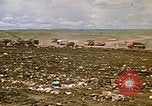 Image of trucks hauling debris Rapid City South Dakota USA, 1972, second 21 stock footage video 65675052516