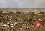 Image of trucks hauling debris Rapid City South Dakota USA, 1972, second 22 stock footage video 65675052516