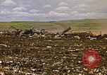 Image of trucks hauling debris Rapid City South Dakota USA, 1972, second 33 stock footage video 65675052516
