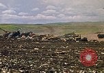 Image of trucks hauling debris Rapid City South Dakota USA, 1972, second 41 stock footage video 65675052516
