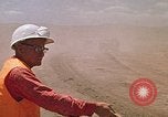Image of trucks hauling debris Rapid City South Dakota USA, 1972, second 42 stock footage video 65675052516