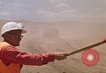 Image of trucks hauling debris Rapid City South Dakota USA, 1972, second 45 stock footage video 65675052516