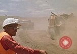 Image of trucks hauling debris Rapid City South Dakota USA, 1972, second 47 stock footage video 65675052516