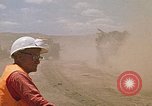 Image of trucks hauling debris Rapid City South Dakota USA, 1972, second 48 stock footage video 65675052516