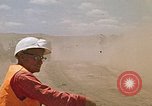 Image of trucks hauling debris Rapid City South Dakota USA, 1972, second 49 stock footage video 65675052516