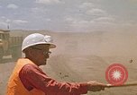 Image of trucks hauling debris Rapid City South Dakota USA, 1972, second 51 stock footage video 65675052516