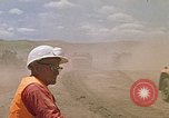 Image of trucks hauling debris Rapid City South Dakota USA, 1972, second 53 stock footage video 65675052516