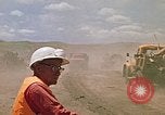 Image of trucks hauling debris Rapid City South Dakota USA, 1972, second 54 stock footage video 65675052516