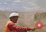 Image of trucks hauling debris Rapid City South Dakota USA, 1972, second 55 stock footage video 65675052516