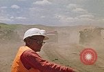 Image of trucks hauling debris Rapid City South Dakota USA, 1972, second 56 stock footage video 65675052516