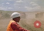 Image of trucks hauling debris Rapid City South Dakota USA, 1972, second 57 stock footage video 65675052516