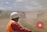 Image of trucks hauling debris Rapid City South Dakota USA, 1972, second 58 stock footage video 65675052516