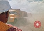 Image of trucks hauling debris Rapid City South Dakota USA, 1972, second 60 stock footage video 65675052516