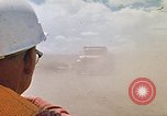 Image of trucks hauling debris Rapid City South Dakota USA, 1972, second 62 stock footage video 65675052516
