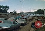 Image of trucks hauling wrecked cars Rapid City South Dakota USA, 1972, second 8 stock footage video 65675052517